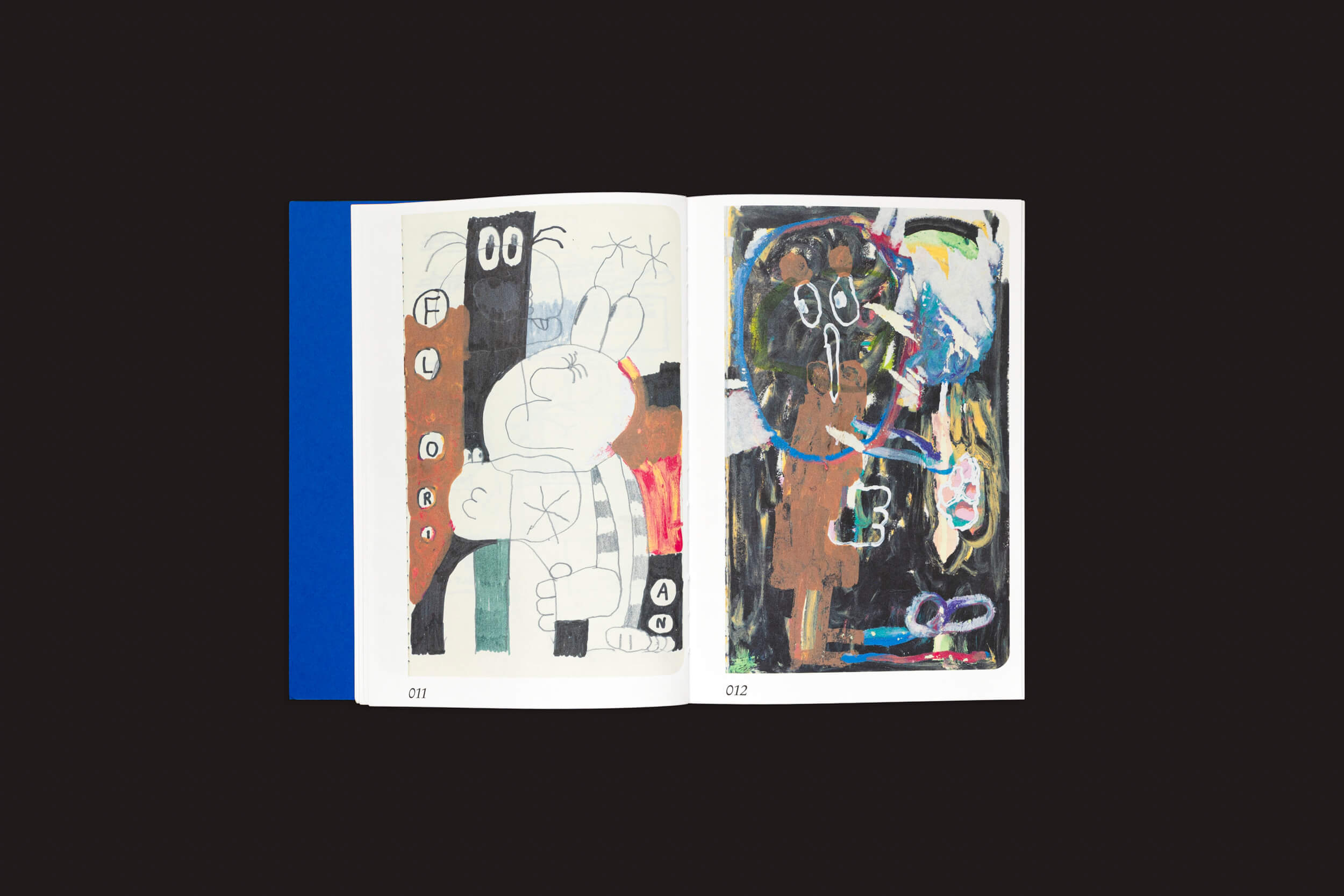 O livro aberto apresenta o estilo artístico de Mark Bohle para Handshake: a página da esquerda exibe um personagem de desenho animado com mãos exageradas, enquanto a página da direita destaca uma vibrante peça de mídia mista de Pica Pica com formas abstratas em um fundo escuro.