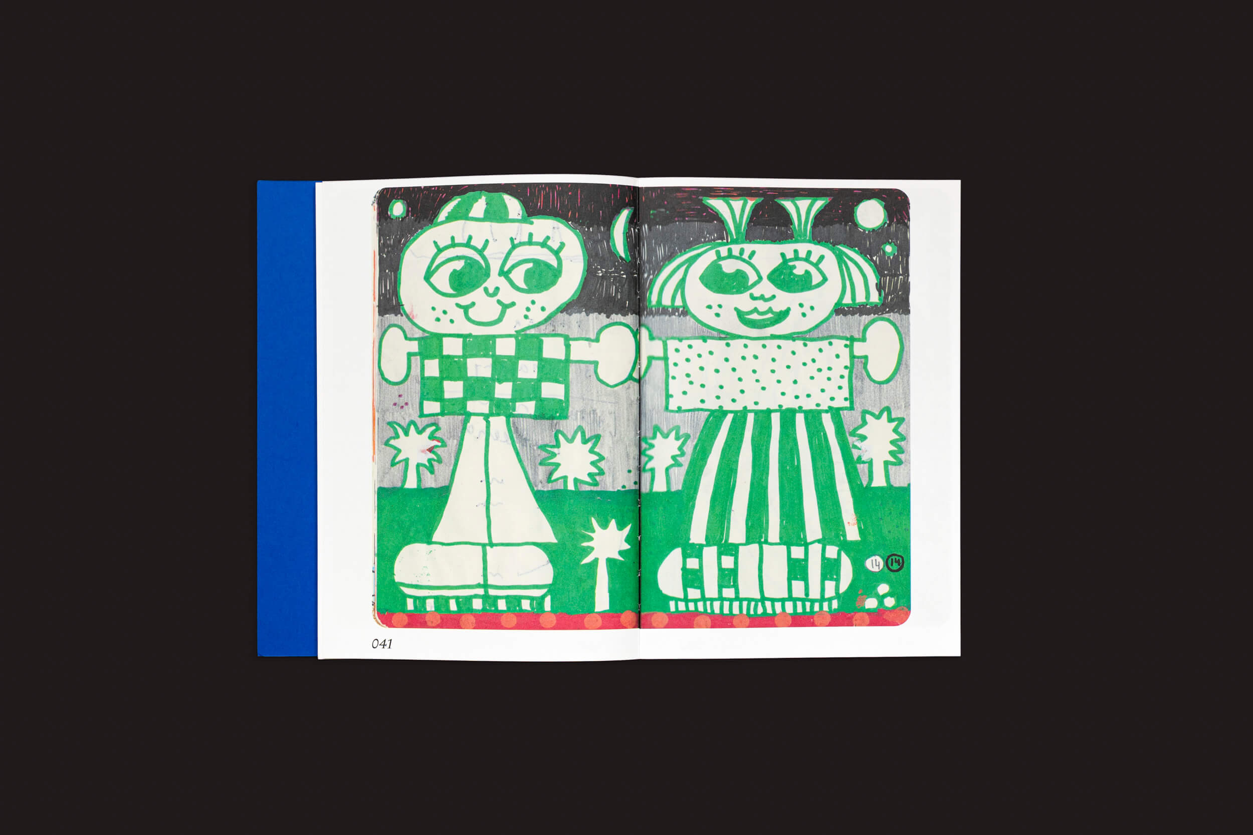 Um livro aberto mostra uma ilustração abstrata vibrante de Mark Bohle: Pica Pica de Handshake, retratando duas figuras sorridentes trabalhadas com formas geométricas verdes, brancas e vermelhas em um fundo preto ousado. O espírito lúdico é capturado na página 041.