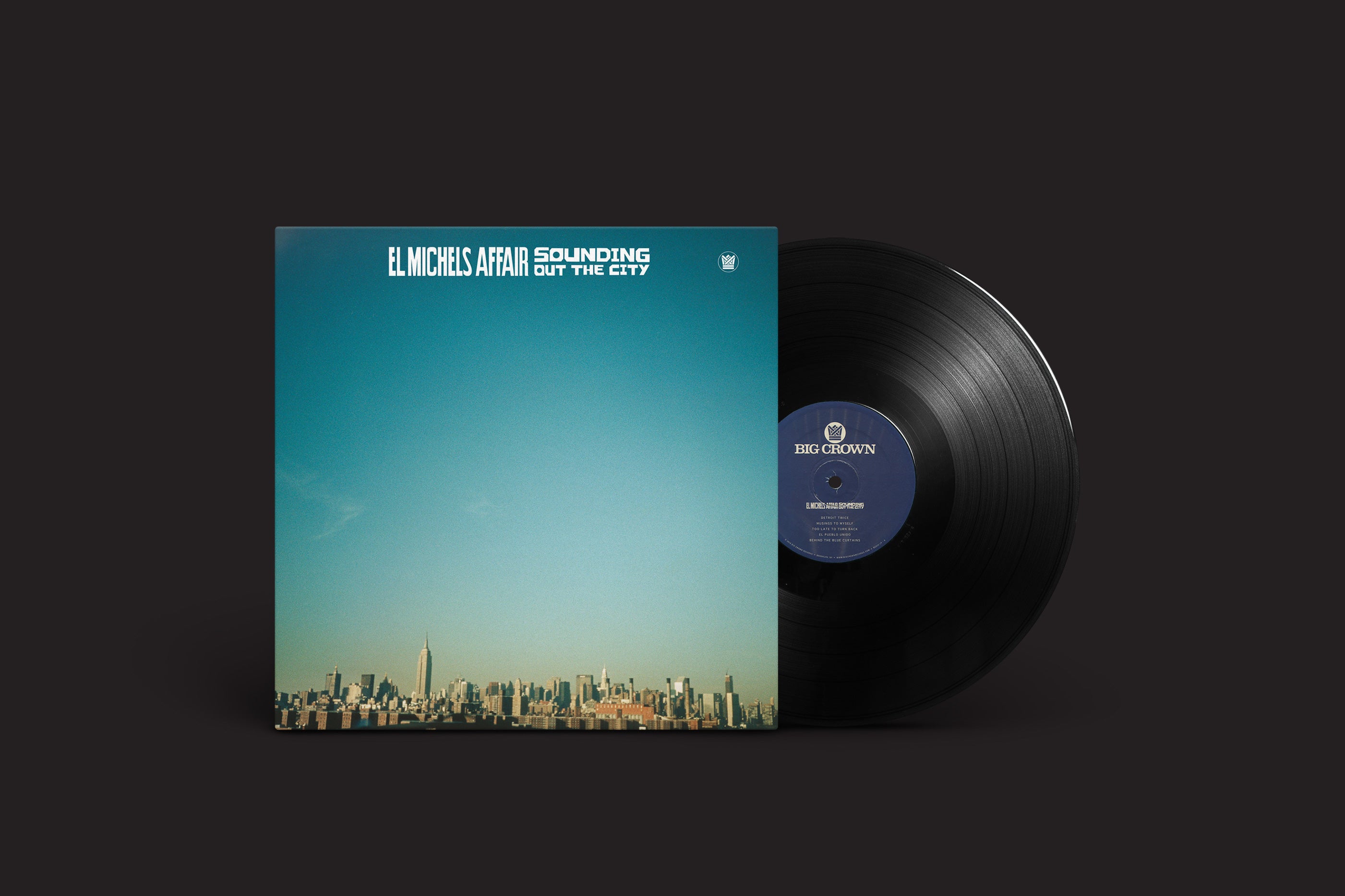 A imagem apresenta um disco de vinil de "El Michels Affair: Sounding Out The City", mostrando uma capa de álbum com tema de horizonte. Lançado pela Big Crown Records, ele encapsula a vibração do soul retrô contra um fundo preto.