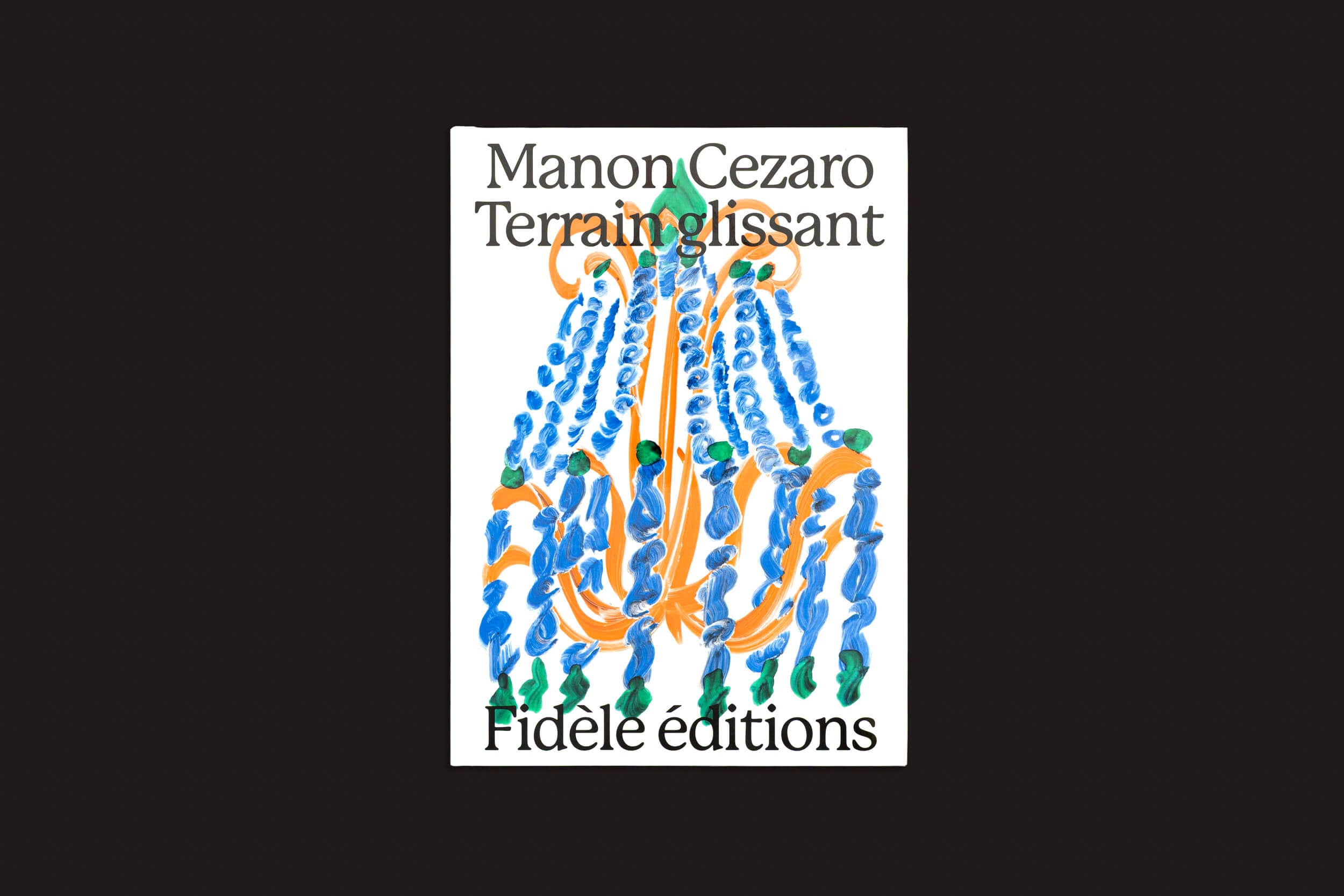 A capa apresenta linhas onduladas abstratas em azul e laranja com pequenas formas verdes sobre fundo branco. O título é Manon Cezaro: Terrain Glissant, publicado pela Fidéle Editions.