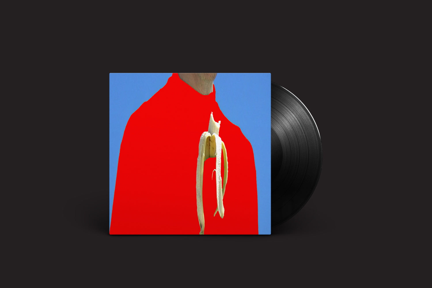 O vinil Sam Gendel: DRM da Nonesuch Records apresenta uma capa marcante com uma pessoa em vermelho contra azul segurando uma banana descascada. Ele mistura lindamente instrumentos vintage com sons modernos, oferecendo uma experiência de áudio inesquecível.